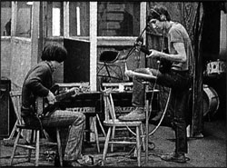 Ca. Spring 1969, recording sessions for Tommy, with both Pete and John using unlabeled customized Sound City L100 amplifier heads, with Hiwatt-style chicken head knobs. Pete’s guitar is 1968 Gibson SG Special.