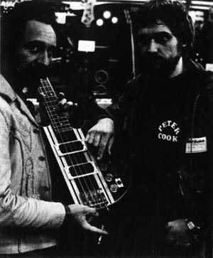 John with guitar maker Peter Cook.