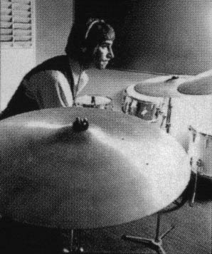 Keith during the recording of Tommy, with a combination of White Marine Pearl and Champagne Silver Premier drums.