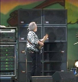Ca. 1999, August 1999, John Entwistle Band solo performance with Status Graphite Buzzard Bass and towering amp rig.