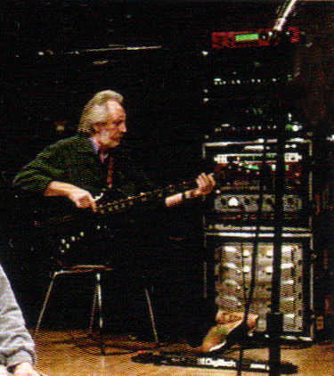 Ca. 2002, in rehearsals, John with Status Graphite Buzzard Bass and amp rig.