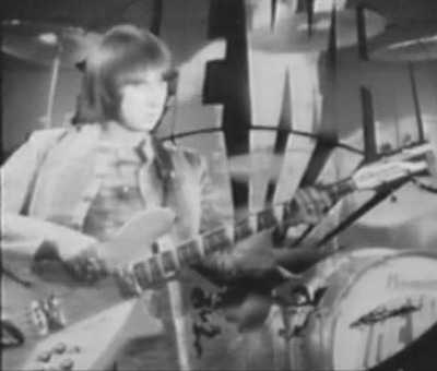 Ca. August 1969, from the Beat Club Tommy promo, John’s Rickenbacker 4005.
