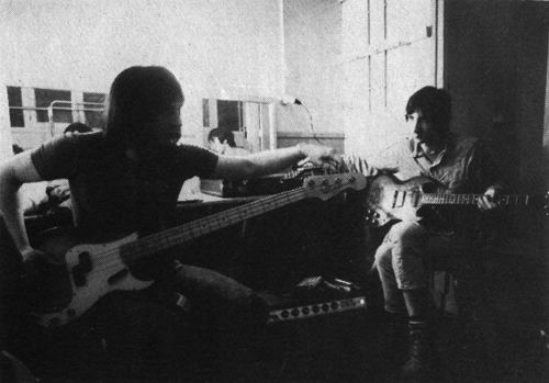 Ca. 1969 or 1970, tuning up in the dressing room with the “Frankenstein” Fender Precision bass.