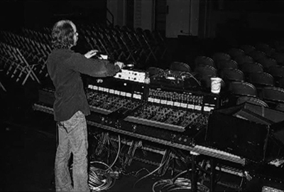 Click to view larger version. Bobby Pridden at front-of-house with two Sunn Coliseum Audio Controller 8-ch. boards. WEM Copicat echo unit for tape echoes visible on top of right-side desk. (Photo: SoundCityChris)