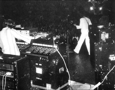 Click to view larger version. 21 Aug. 1972, KB-Hallen, Denmark, two Sunn Coliseum Audio Controller 8-ch. boards for foldback at stage left. At right can be seen Heil stencil on rear of sidestage monitor stack. WEM Copicat echo unit for tape echoes visible on top of right-side desk.