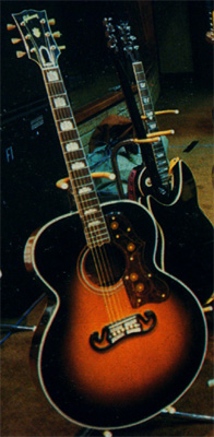 In the studio, ca. 1981, with alternate Gibson J-200, a pre-1961 model.