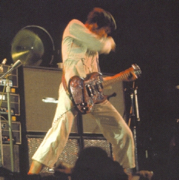 Close-up of large film lamp (off) behind Pete’s amps, at the third Isle of Wight Festival, 29–30 August 1970.
