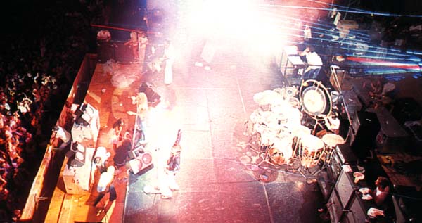 1976, with laser projection visible from backstage.