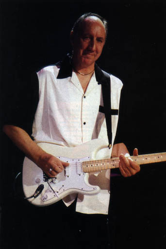 Ca. 1999, with Olympic White model fitted with Fishman Powerbridge tremolo and extra control knob.