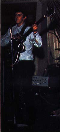 Ca. 1965, John playing a Gretsch 6070 Hollow Body bass.