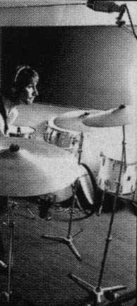 Keith during the recording of Tommy, with a combination of White Marine Pearl and Champagne Silver Premier drums.