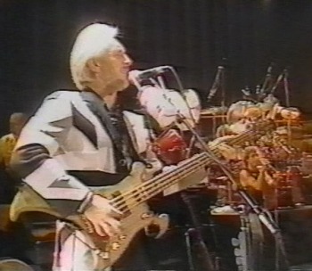 Ca. 1989, with Warwick Buzzard 8-string.
