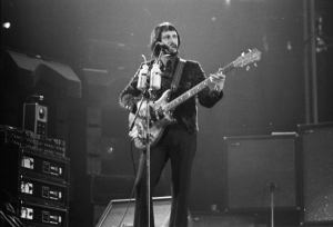 Ca. 1975, with Alembic Series 1 bass. Alembic/Sunn Coliseum Power Amp amplifier rack visible at left.