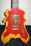 Click to view larger version Custom “Flame” bass, made by Peter Cook. Courtesy whocollection.com.