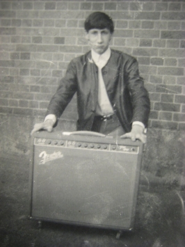 Click to view larger version. Ca. 1963, as the Detours, Pete posing with the uncut Fender Pro 1×15.