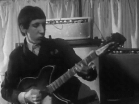 Ca. 1965, feeding back a 1964 Rickenbacker 360/12 Export through an early “stack” of Marshall 4×12 cabinets powered by a Fender Bassman atop the stack, which is daisy-chained to a custom Fender Pro head at lower right.