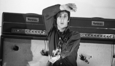 3 Oct. 1966, in CBS studios, John holding French horn. Leaning against the chair, the 1962 Fender Precision Bass, left, and on the floor, the 1966 “Slab” Fender Precision Bass.