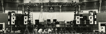 25 November 1973, Dallas, full view of stage setup and front-of-house Heil/Sunn PA bin stacks with white horn bells. Photo: Tom Wright