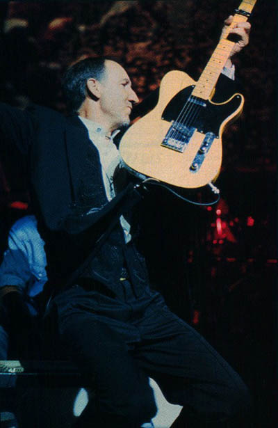 Ca. 1993, with 1952 Fender Telecaster (original or reissue?) fitted with Fender American Standard six-saddle bridge.