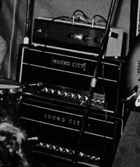 Ca. 1967, two customized Sound City L100 amplifiers, each with different blockscript Sound City nameplate badge; topped by a Grampian Reverb unit.