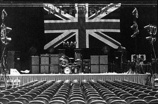 1971 stage setup, showing stageside foldback and two Hiwatt monitor stacks behind the drumkit.