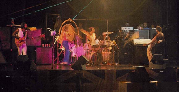 1976, with floor wedge monitors visible across front of stage. Courtesy whocollection.com.